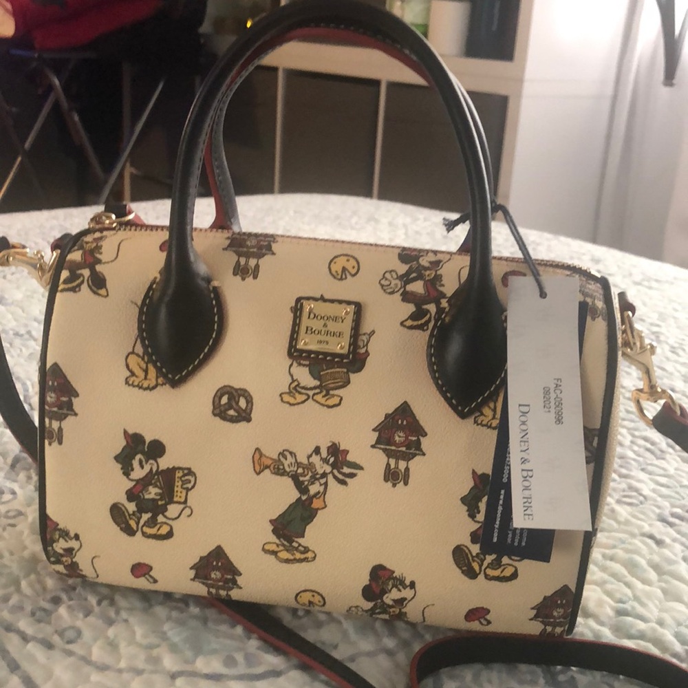 New Epcot  World showcase Germany by. Disney Dooney &  Bourke